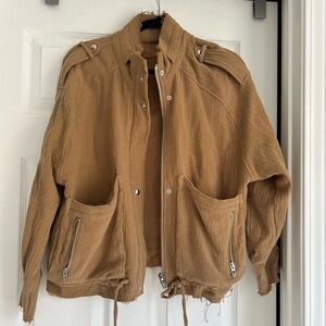 Light-weight tan jacket, runs big